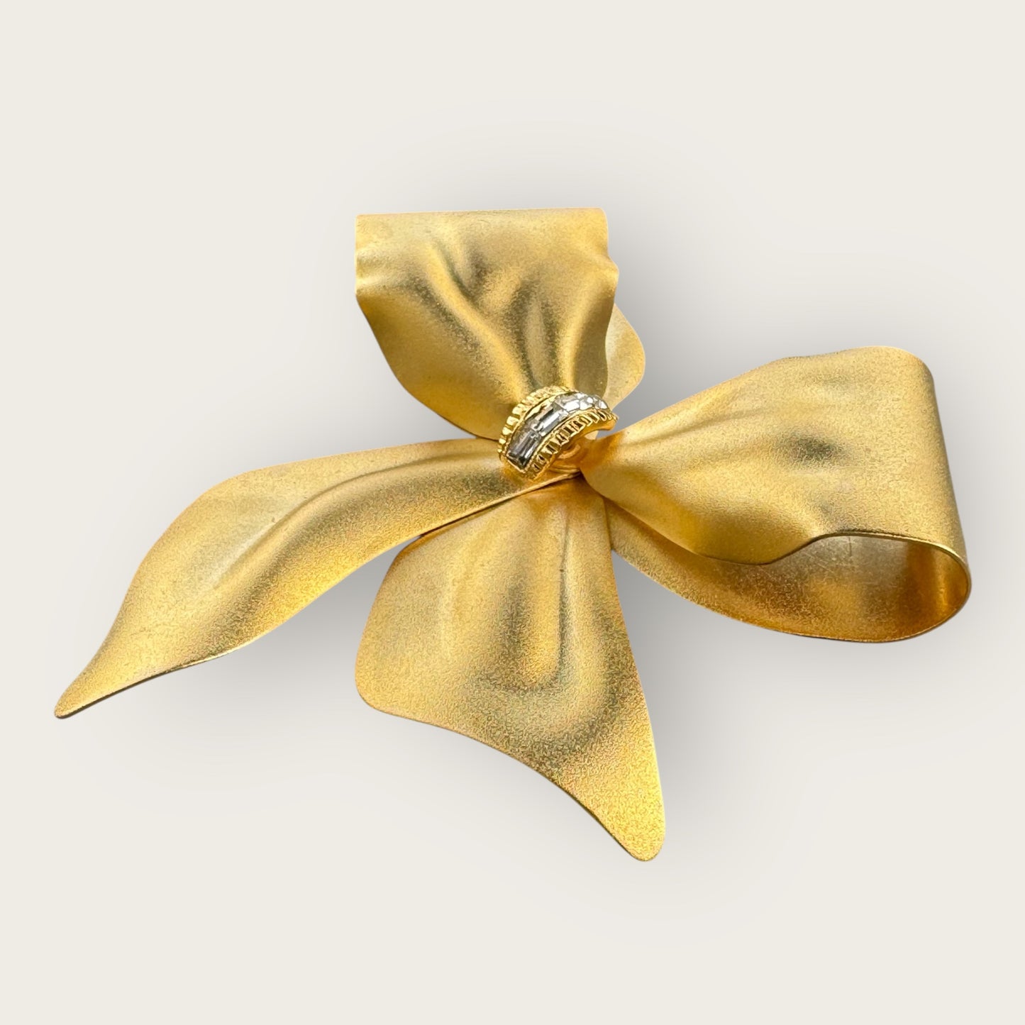 Vintage Gold-Tone Bow Brooch with Clear Rhinestones – Unsigned