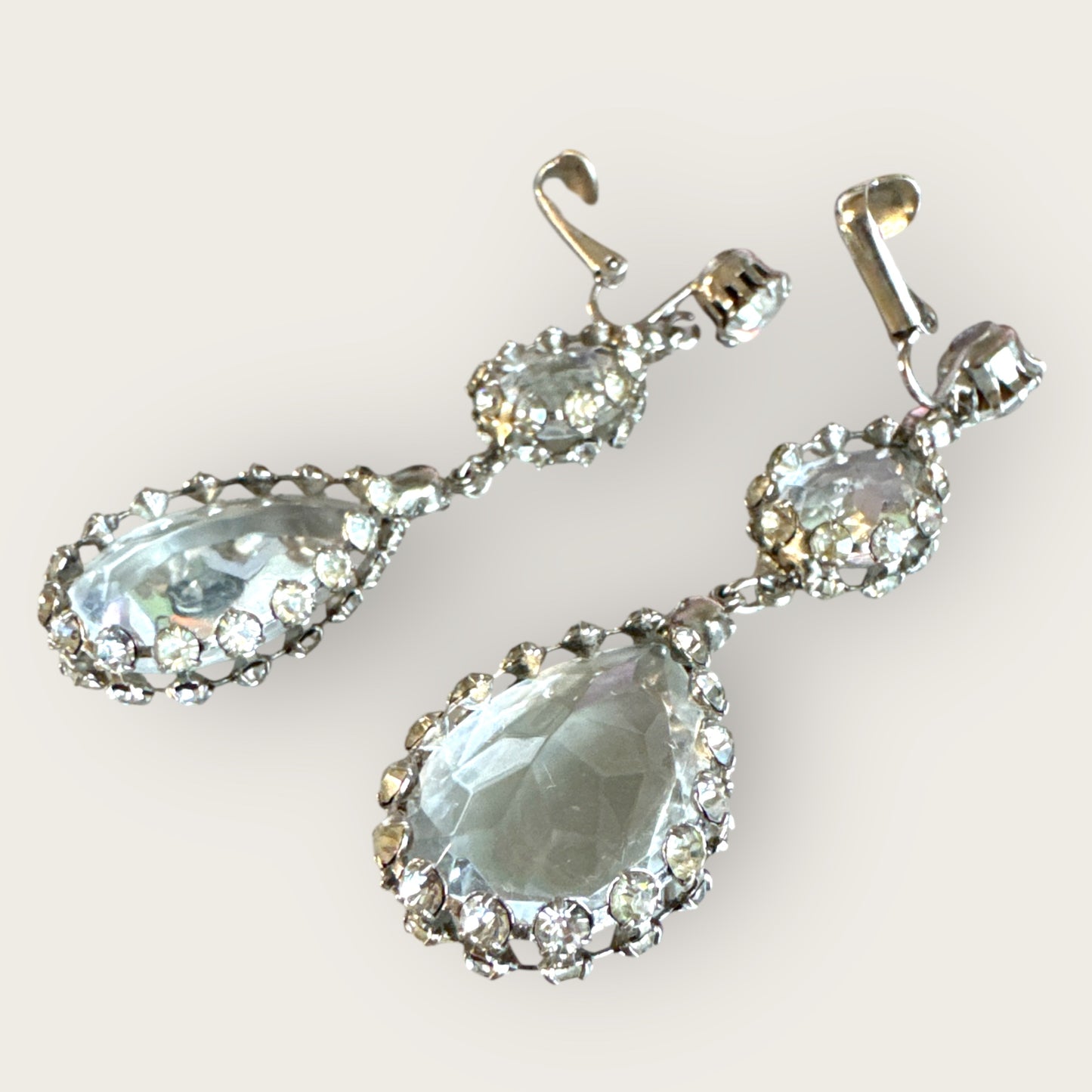 Silvertone Articulated Clip-On Teardrop Earrings with Framed Clear Rhinestones