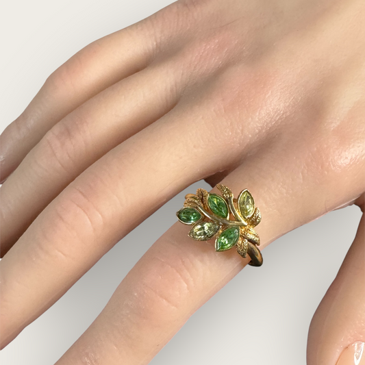 Vintage Signed Avon Gold Tone Leaf Ring with Peridot Marquise Stones and Uranium Glass