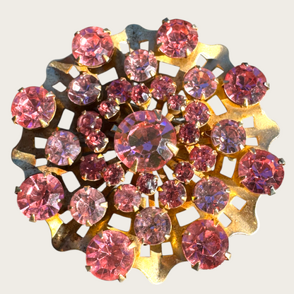 Vintage Mid-Century Pink Rhinestone Domed Starburst Brooch – Layered Openwork Gold Tone