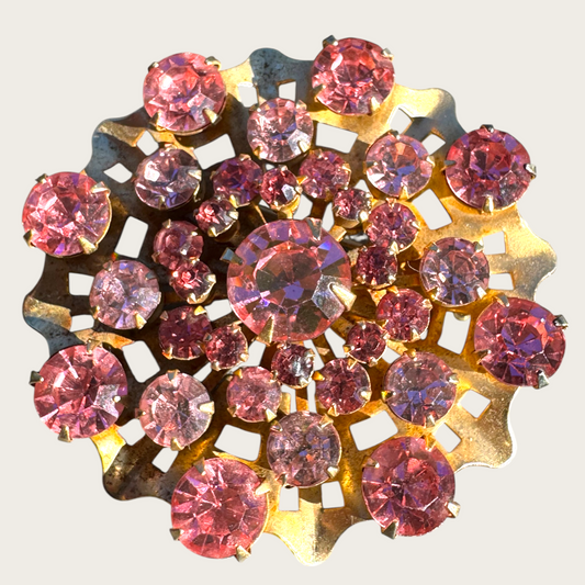 Vintage Mid-Century Pink Rhinestone Domed Starburst Brooch – Layered Openwork Gold Tone