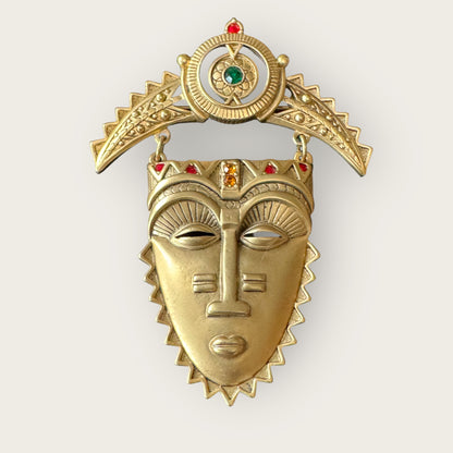 Vintage Avon Articulated Tribal Mask Brooch – Matte Gold with Red, Green & Orange Rhinestones, Signed