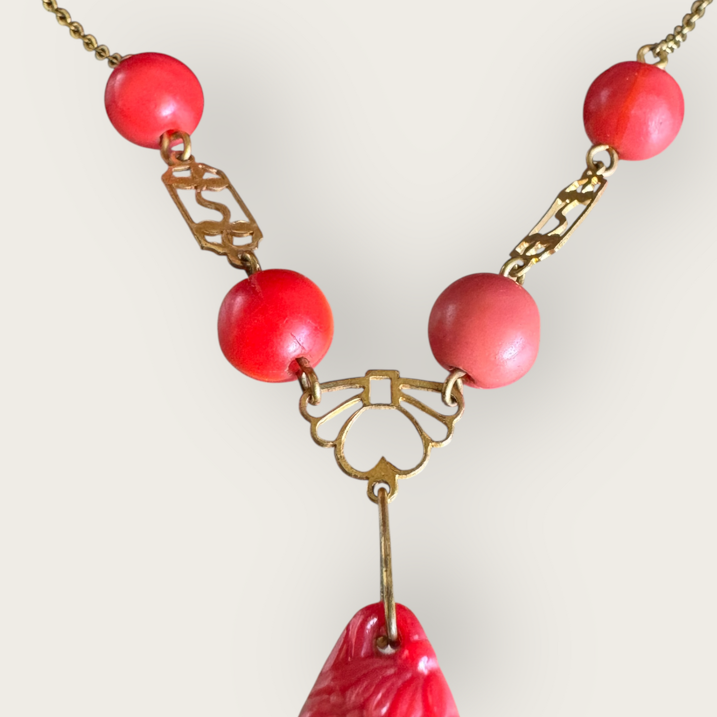 Vintage Asian-Inspired Carved Red Stone Pendant Necklace with Brass-Tone Chain and Glass Beads