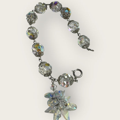 Vintage aurora borealis crystal bracelet with silver filigree spacers and dangle, 1950s