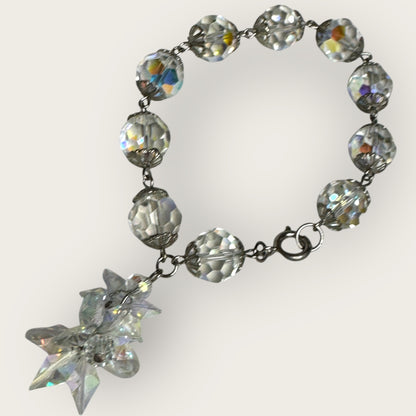 Vintage aurora borealis crystal bracelet with silver filigree spacers and dangle, 1950s