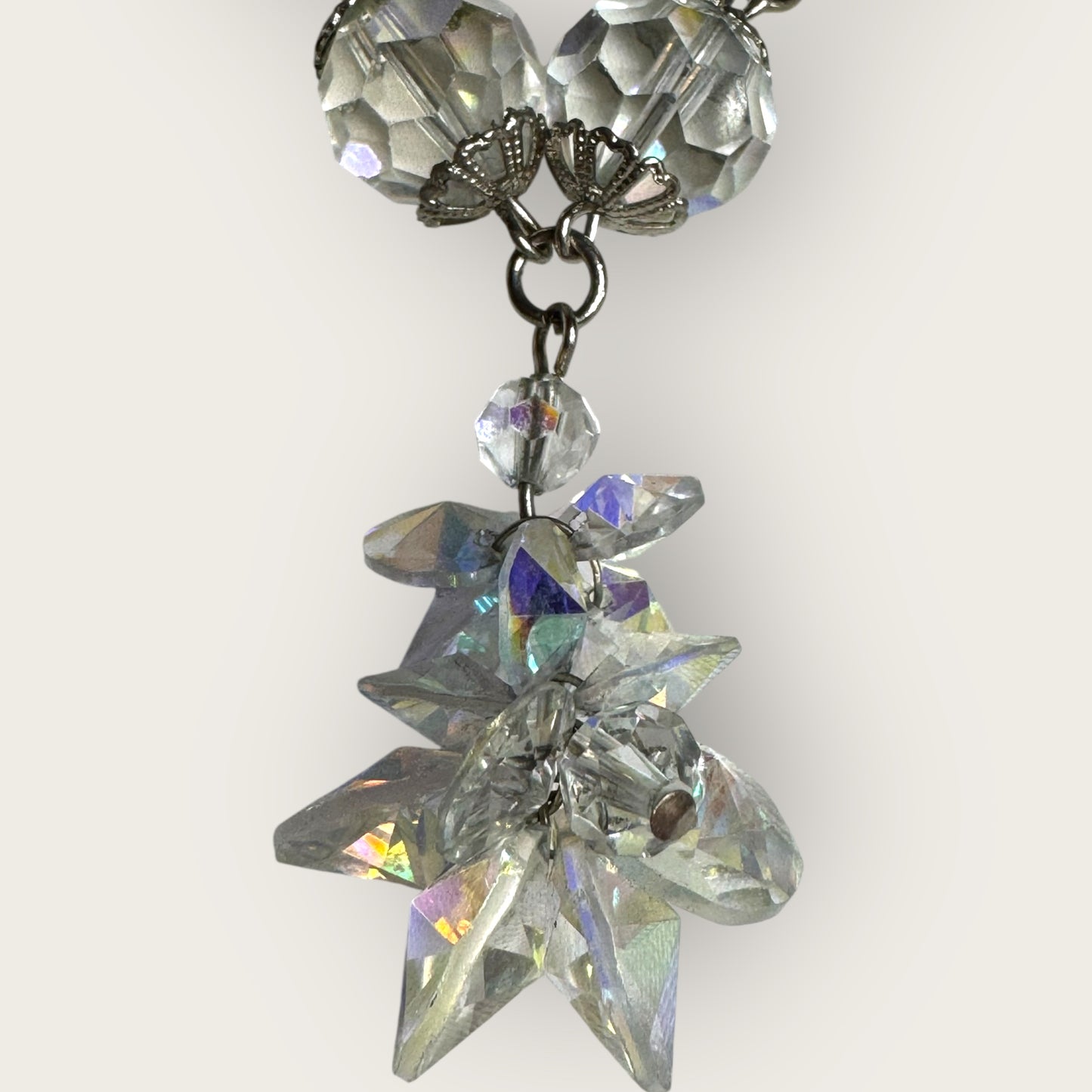 Vintage aurora borealis crystal bracelet with silver filigree spacers and dangle, 1950s