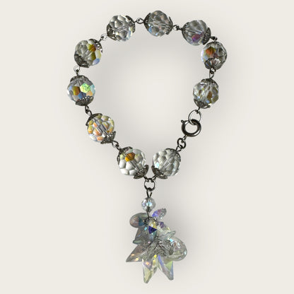 Vintage aurora borealis crystal bracelet with silver filigree spacers and dangle, 1950s
