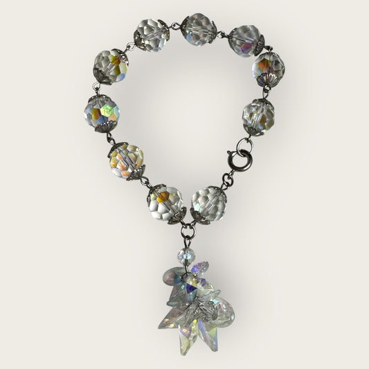Vintage aurora borealis crystal bracelet with silver filigree spacers and dangle, 1950s