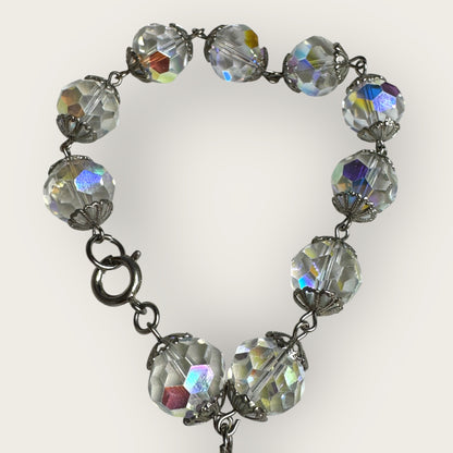 Vintage aurora borealis crystal bracelet with silver filigree spacers and dangle, 1950s