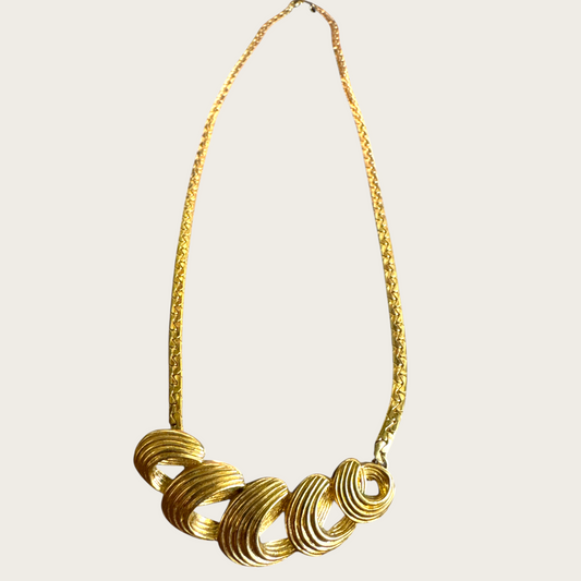 Vintage Monet Gold-Tone Swirl Bar Necklace – 1980s Statement Jewelry