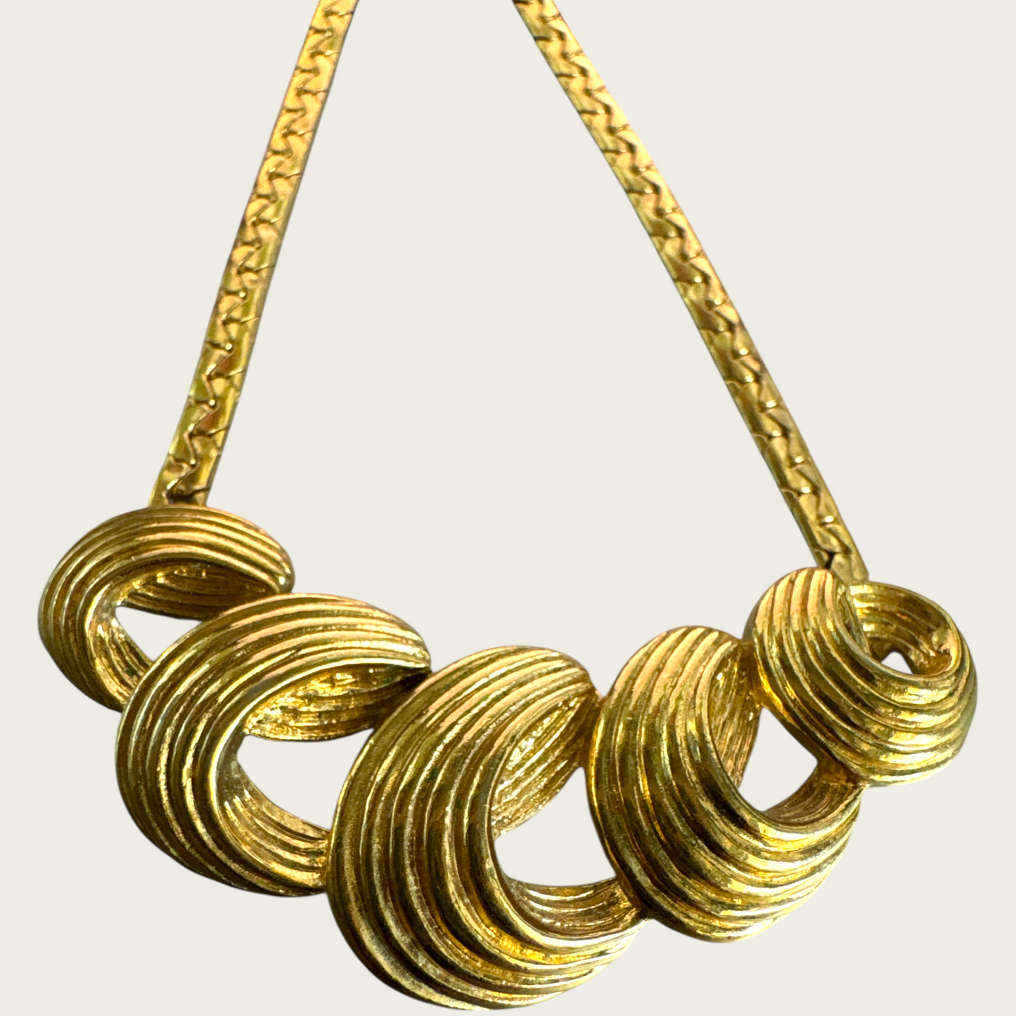 Vintage Monet Gold-Tone Swirl Bar Necklace – 1980s Statement Jewelry