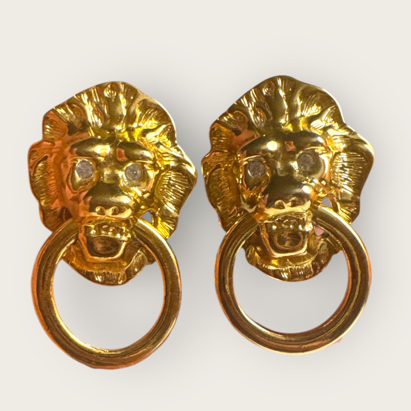 Vintage KJL for Avon Lionhead Door Knocker Earrings – Gold Tone Clip-On Statement Jewelry with Rhinestone Eyes