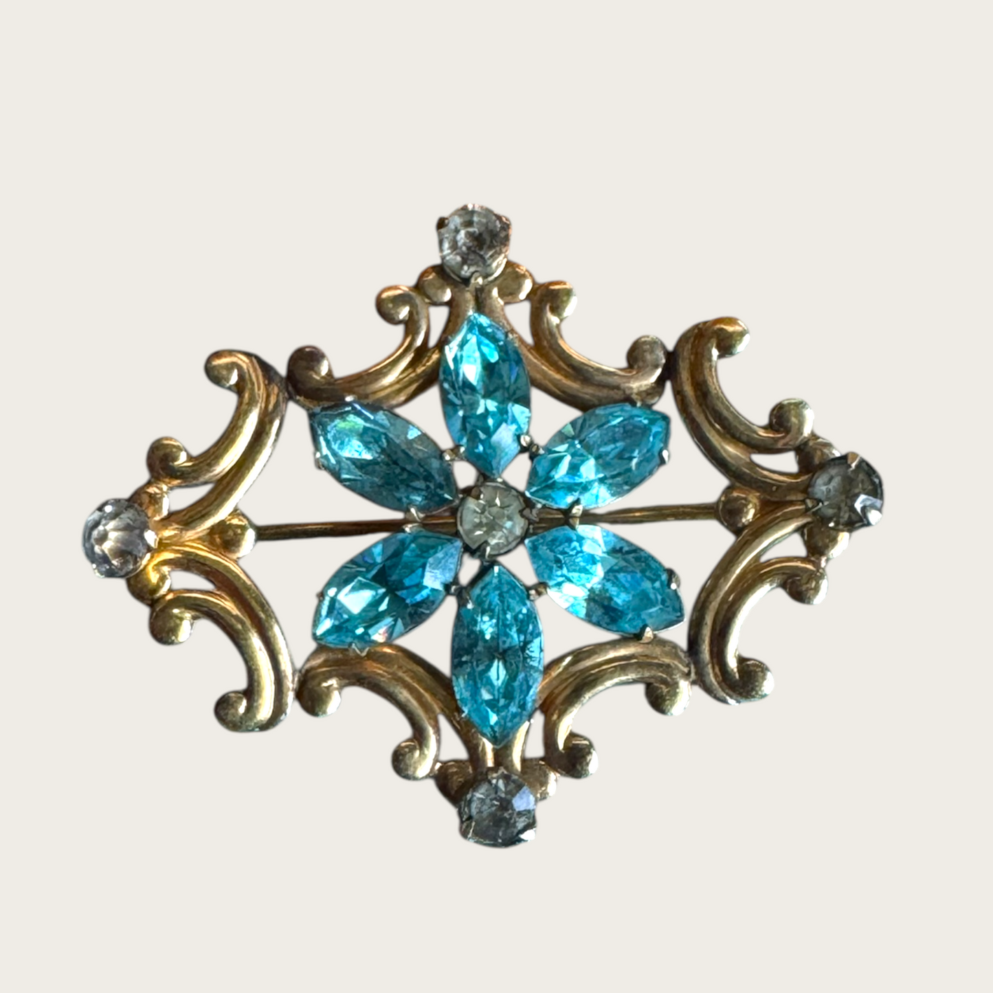 Vintage Simmons Blue Rhinestone Scroll Brooch-Pendant – 1940s Floral Motif in Gold Tone