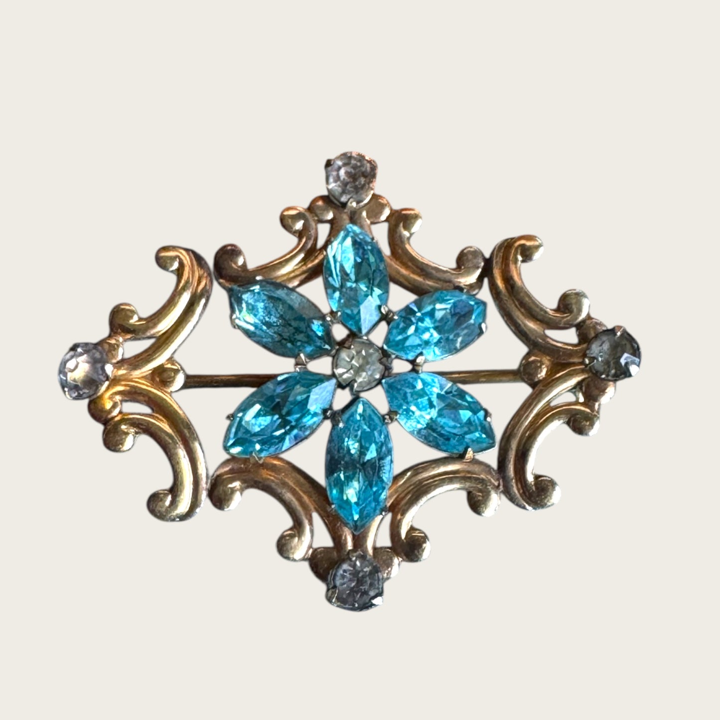 Vintage Simmons Blue Rhinestone Scroll Brooch-Pendant – 1940s Floral Motif in Gold Tone