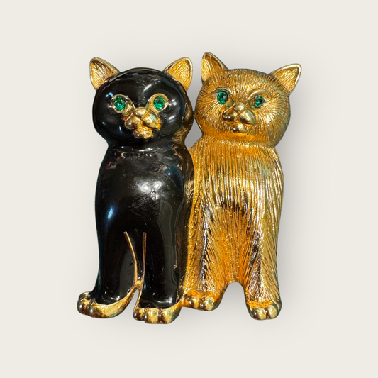 Vintage Swarovski Dual Cats Brooch – Black Enamel & Brushed Gold Tone with Emerald Crystal Eyes (c. 1980s–1990s)