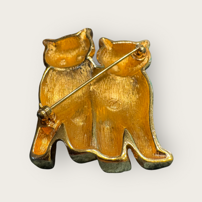 Vintage Swarovski Dual Cats Brooch – Black Enamel & Brushed Gold Tone with Emerald Crystal Eyes (c. 1980s–1990s)