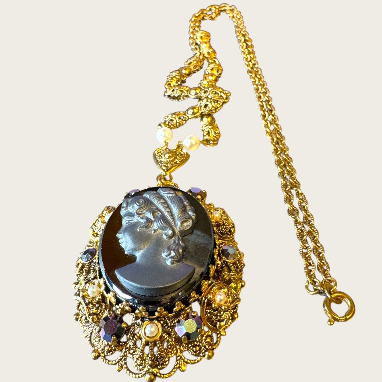 Vintage West Germany Hematite Glass Cameo Pendant Necklace – Ornate Filigree Frame with Pearls & Faceted Stones – Signed 1960s