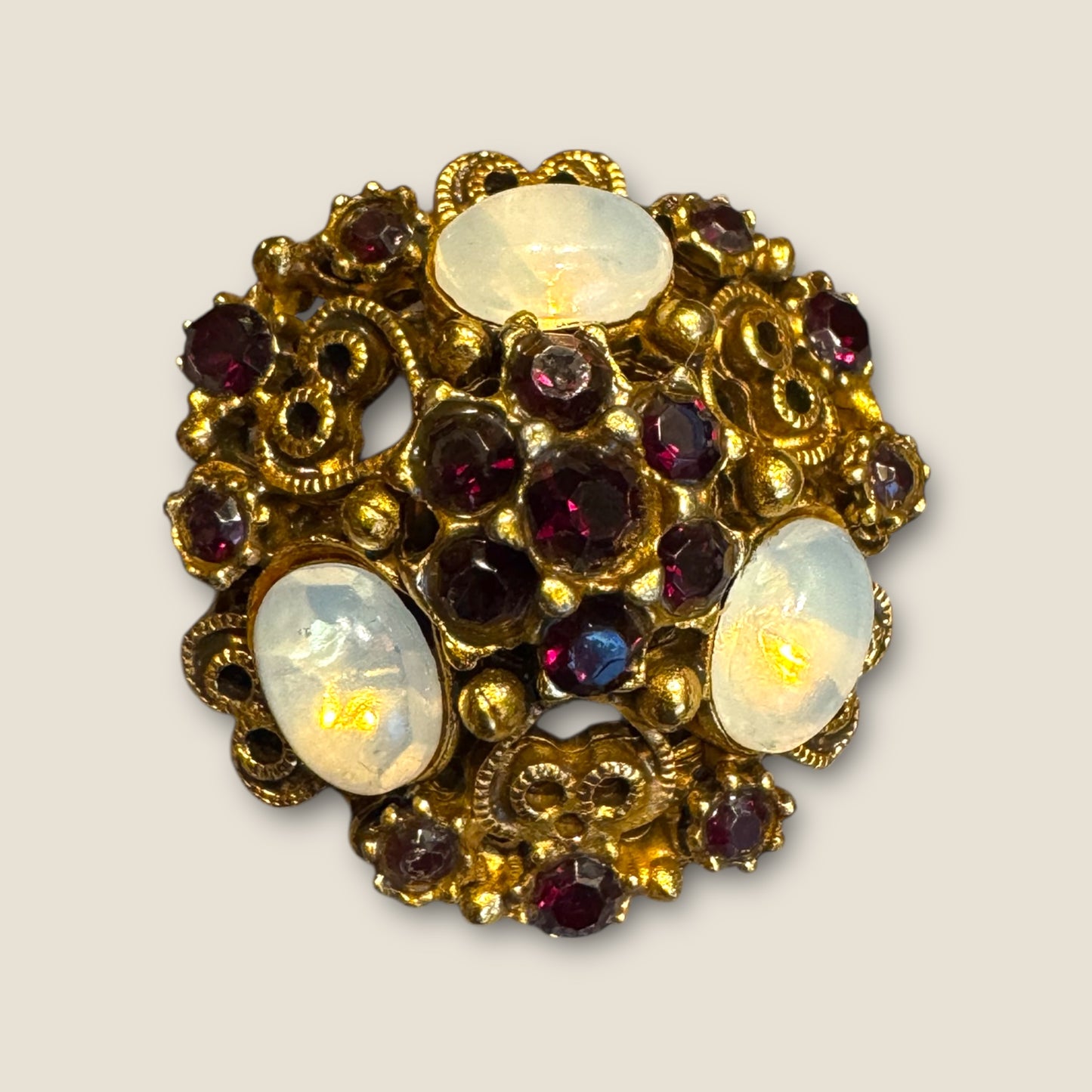 Vintage Florenza Domed Filigree Brooch – Antique Gold with Garnet Rhinestones & Moonstone Cabochons