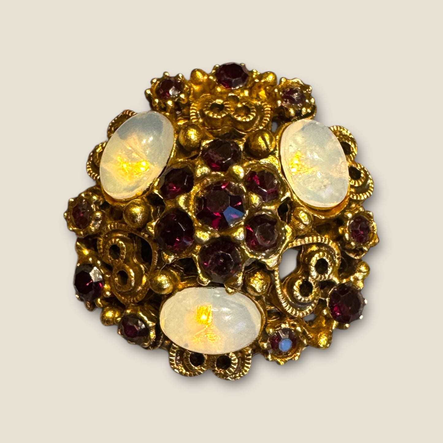 Vintage Florenza Domed Filigree Brooch – Antique Gold with Garnet Rhinestones & Moonstone Cabochons