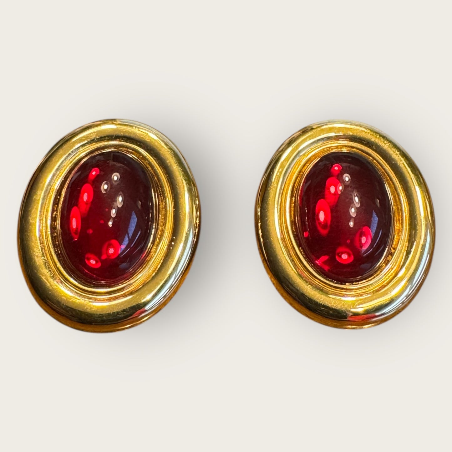 Vintage Monet Oval Glass Cabochon Clip-On Earrings – Ruby Red Cabochon, High-Polish Gold Tone