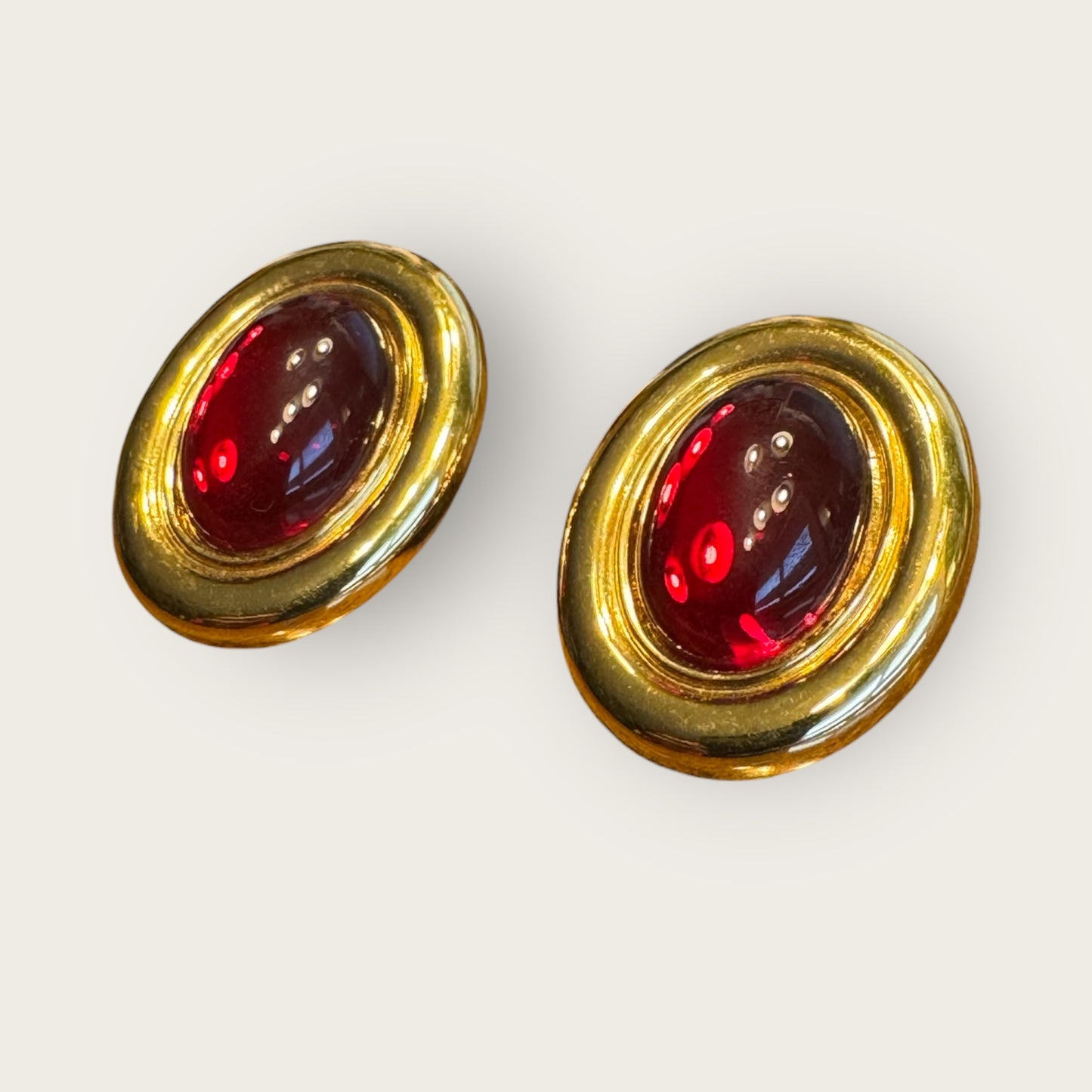 Vintage Monet Oval Glass Cabochon Clip-On Earrings – Ruby Red Cabochon, High-Polish Gold Tone