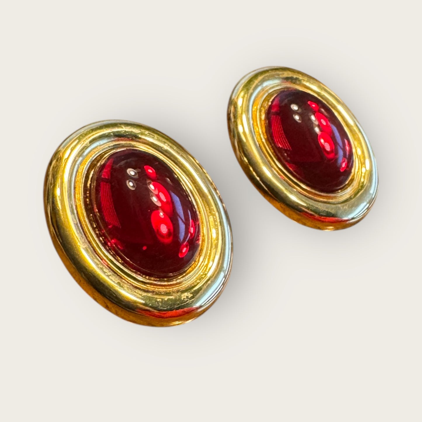 Vintage Monet Oval Glass Cabochon Clip-On Earrings – Ruby Red Cabochon, High-Polish Gold Tone