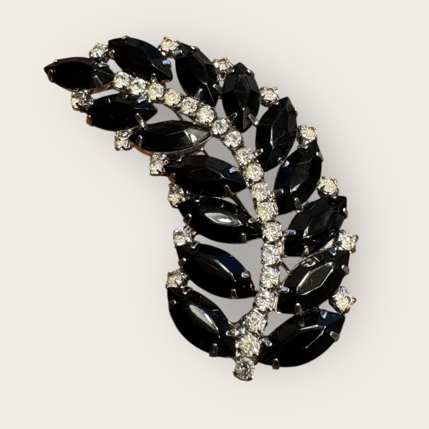 Mid-Century Jet Black Navette Leaf Rhinestone Brooch – Silver-Tone Curved Spray Pin