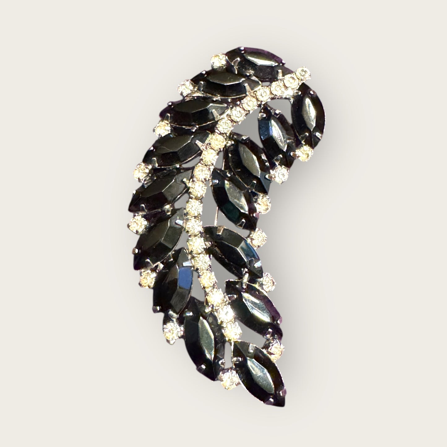 Mid-Century Jet Black Navette Leaf Rhinestone Brooch – Silver-Tone Curved Spray Pin