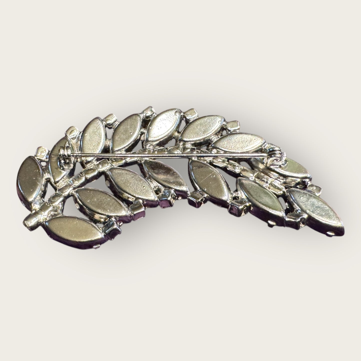 Mid-Century Jet Black Navette Leaf Rhinestone Brooch – Silver-Tone Curved Spray Pin