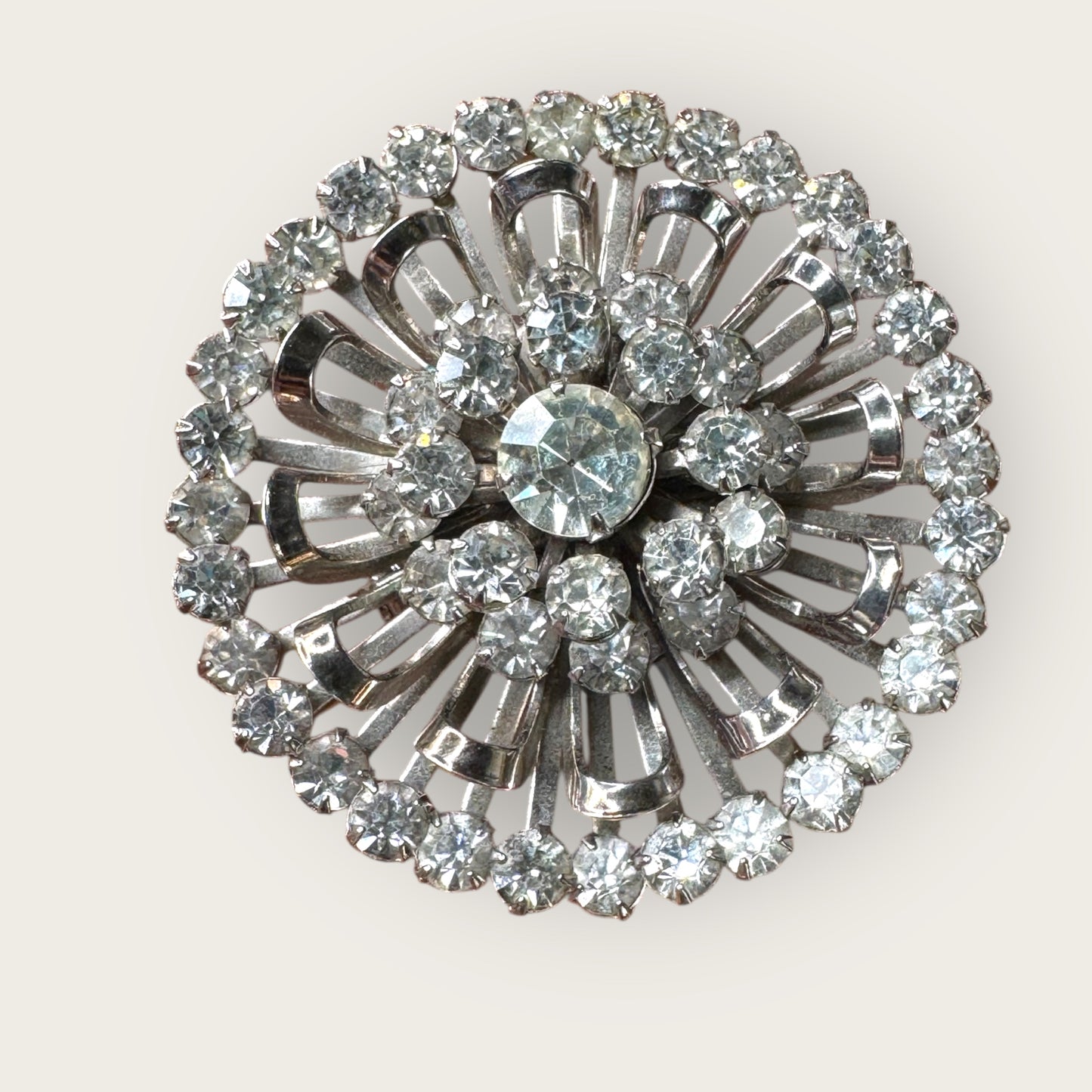 Mid-Century Layered Clear Rhinestone Burst Brooch – Silvertone Radiance