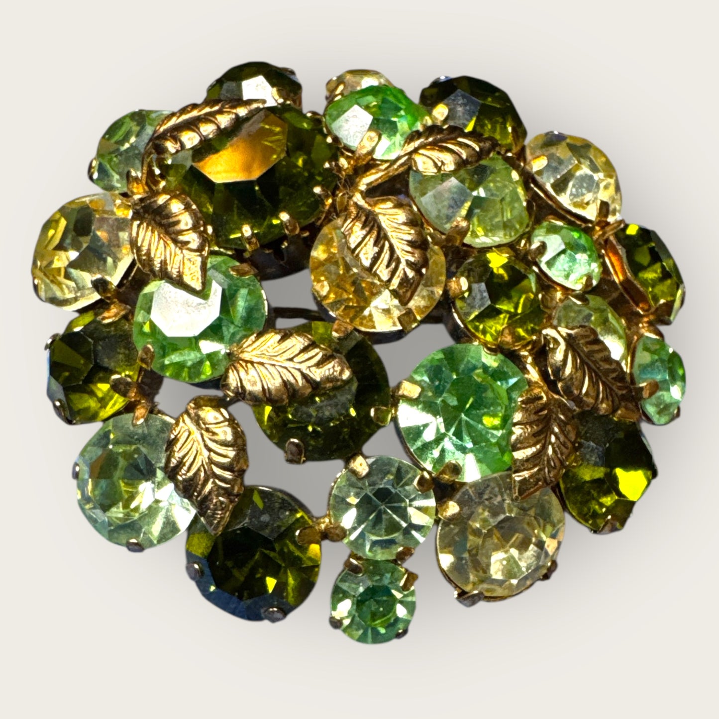 Vintage Austrian Domed Green Rhinestone & Uranium Glass Brooch – Gold-Tone Leaf Accents Signed Austria