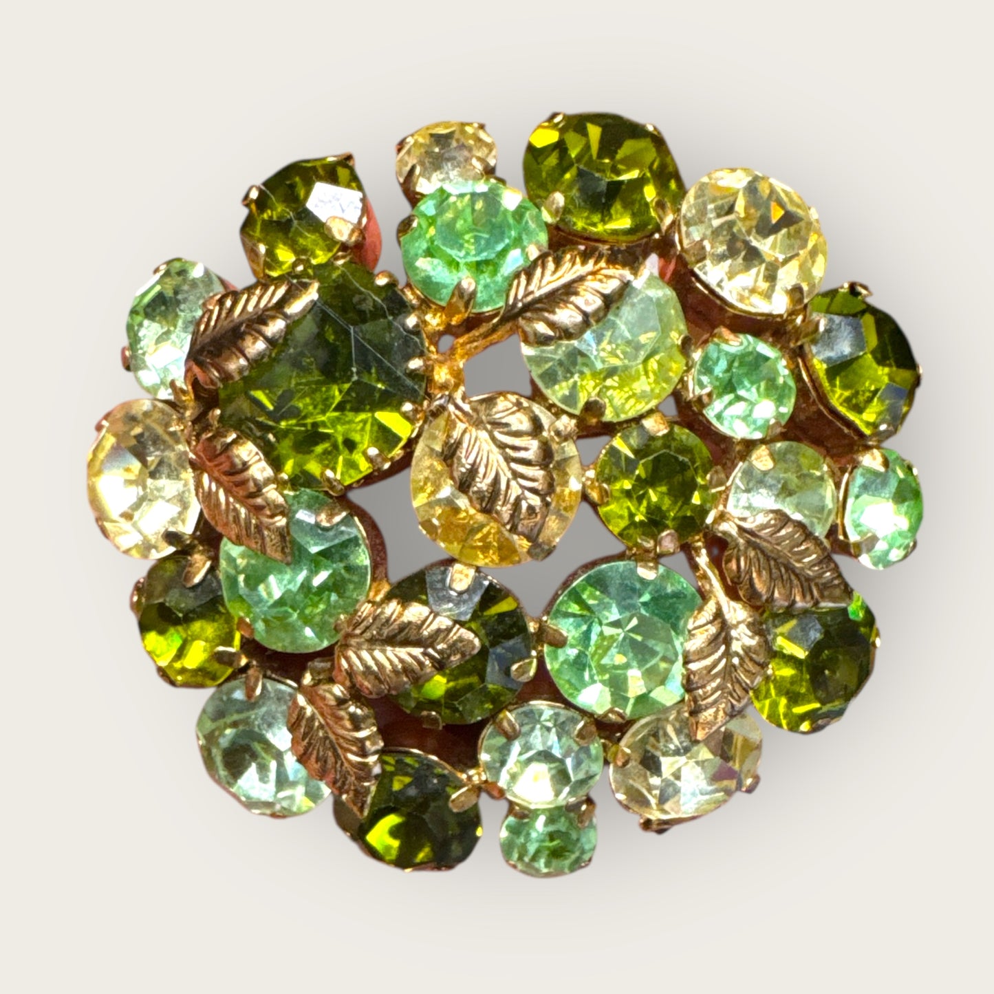 Vintage Austrian Domed Green Rhinestone & Uranium Glass Brooch – Gold-Tone Leaf Accents Signed Austria