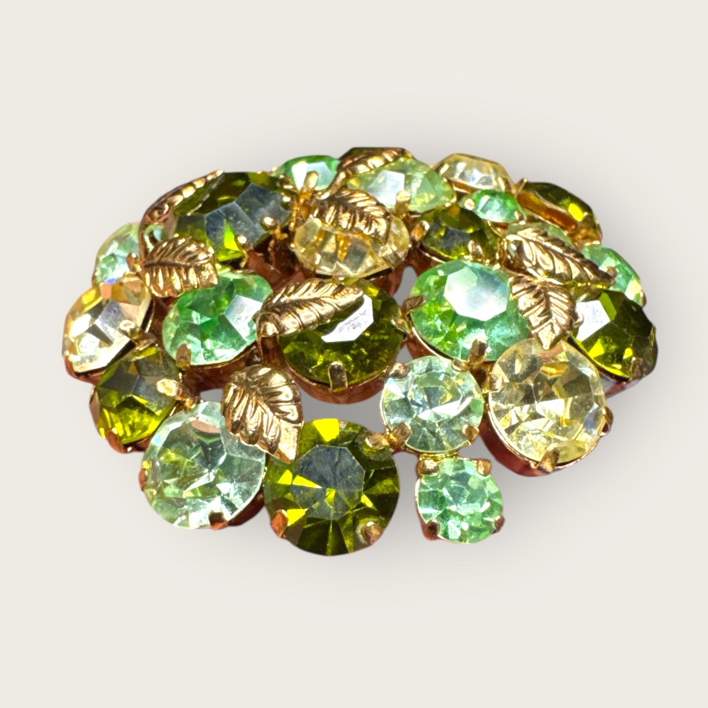 Vintage Austrian Domed Green Rhinestone & Uranium Glass Brooch – Gold-Tone Leaf Accents Signed Austria