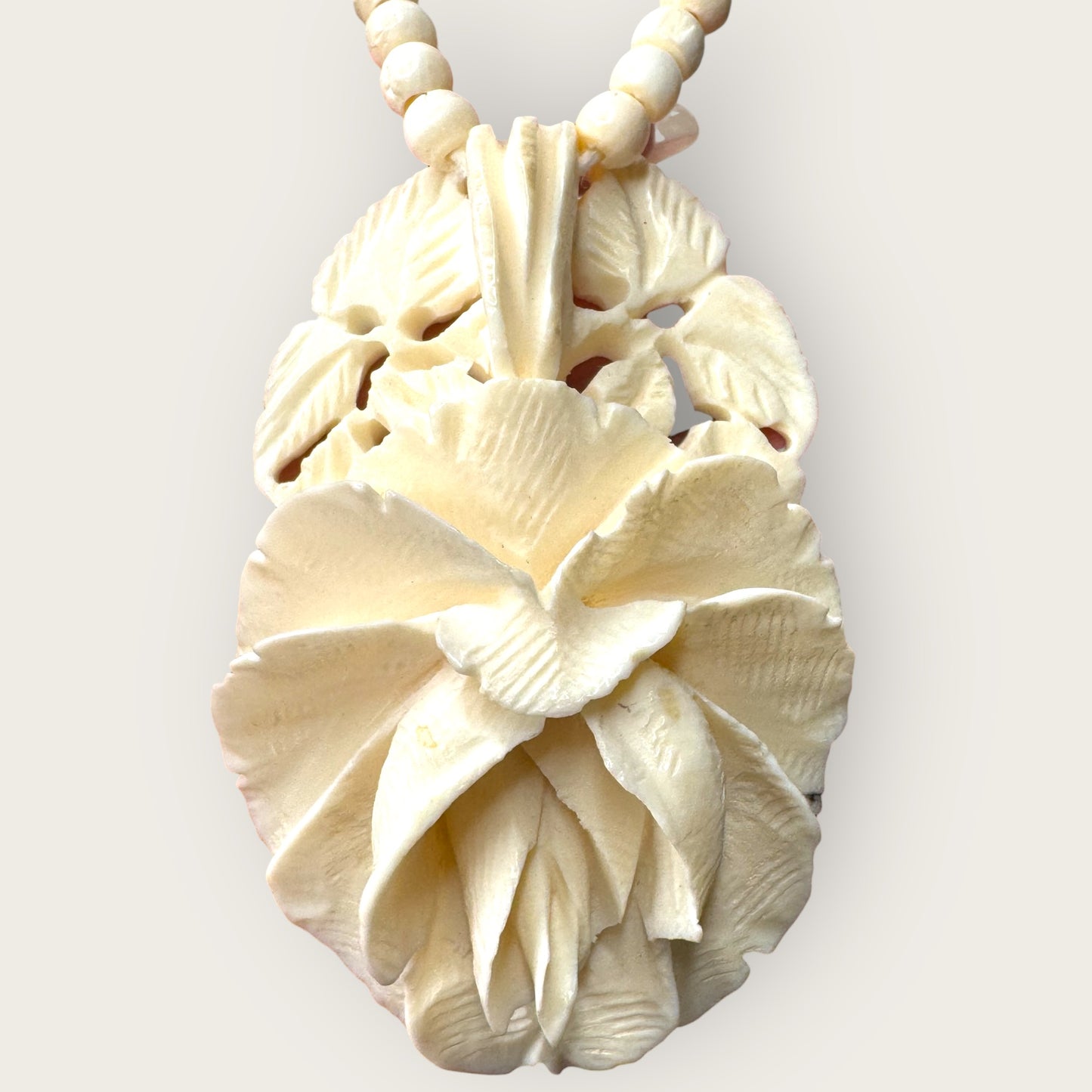 Hand-Carved Bone Rose Necklace – 1970s Artisan Floral Pendant & Beaded Strand