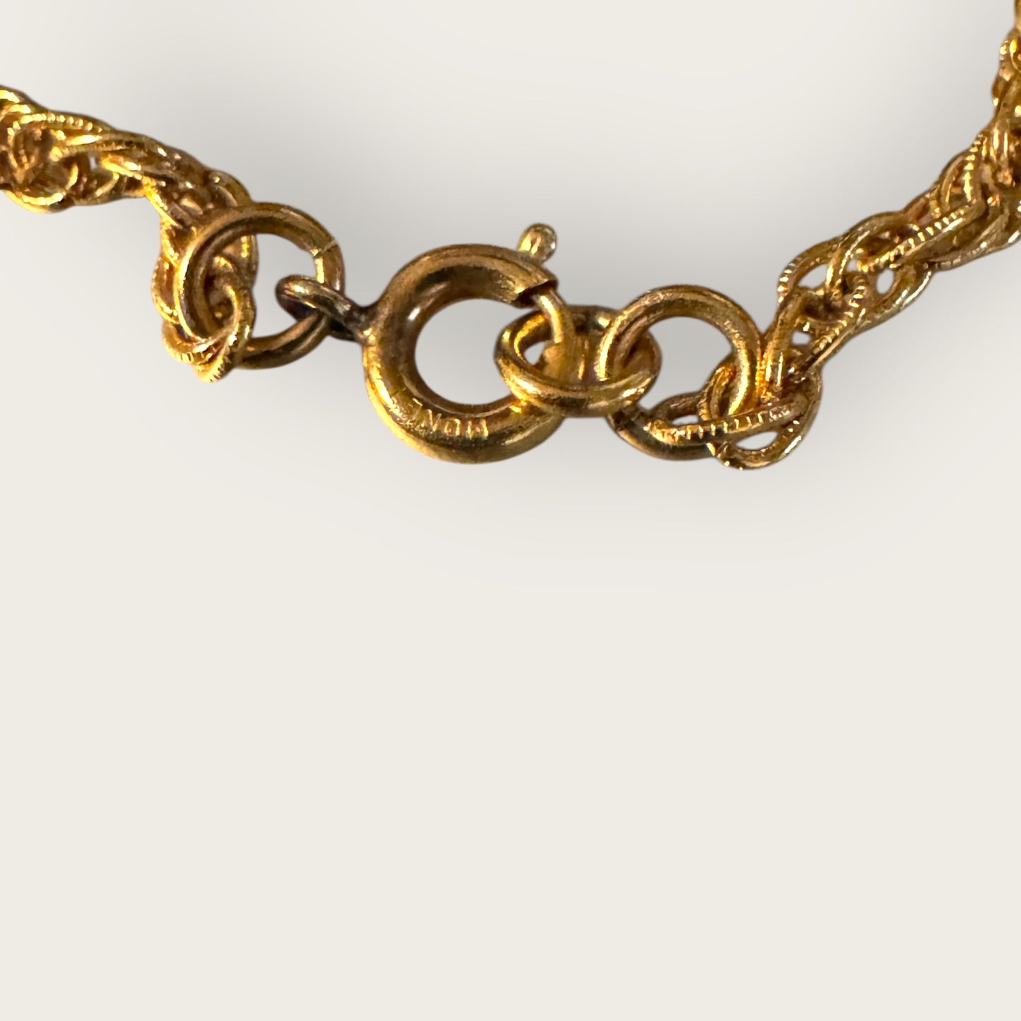 Vintage 1975 Monet “Felice” Statement Pendant Necklace – Gold-Tone Textured Scrollwork | Book Piece