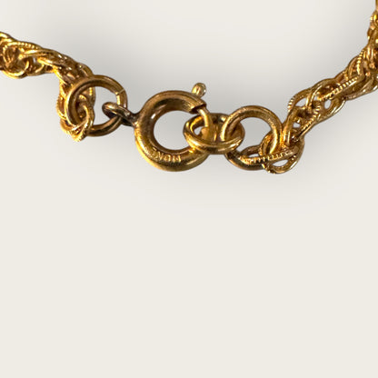 Vintage 1975 Monet “Felice” Statement Pendant Necklace – Gold-Tone Textured Scrollwork | Book Piece