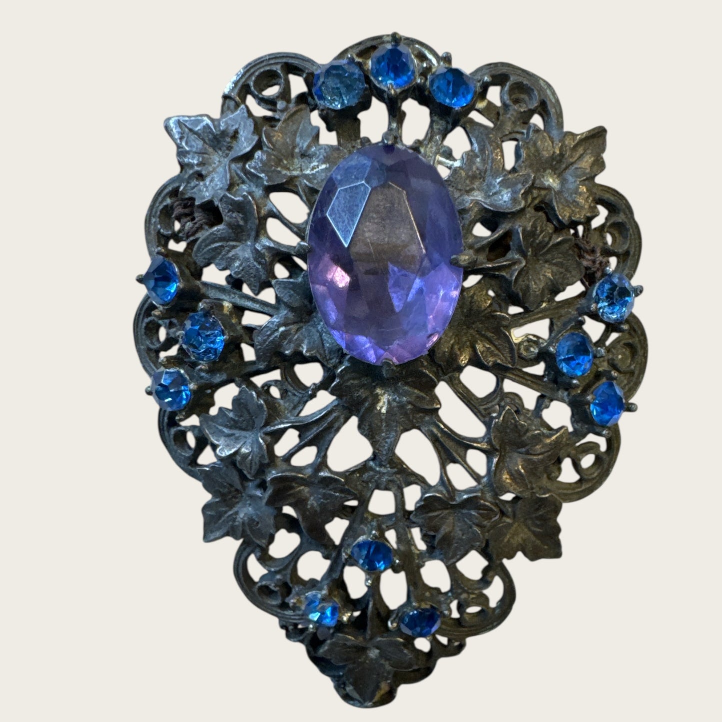 Antique Victorian Bohemian Filigree Brooch with Blue Rhinestones & Purple Center Cabochon – Hand-Repaired Heirloom, c. 1890–1910