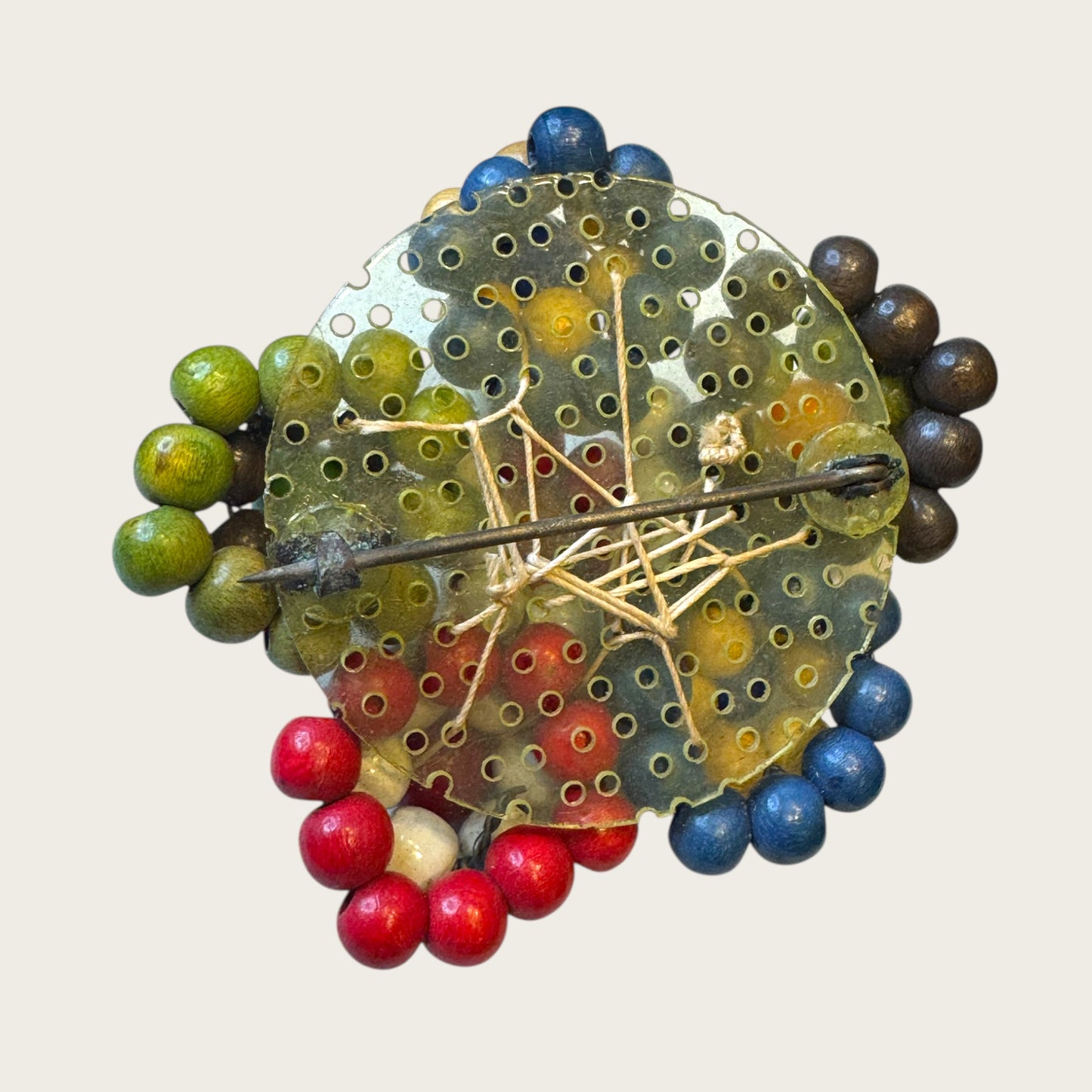 Antique 1930s Wooden Bead Floral Brooch – Hand-Woven Folk Art on Early Plastic Plate (Unsigned)Antique 1930s Wooden Bead Floral Brooch – Hand-Woven Folk Art on Early Plastic Plate (Unsigned)