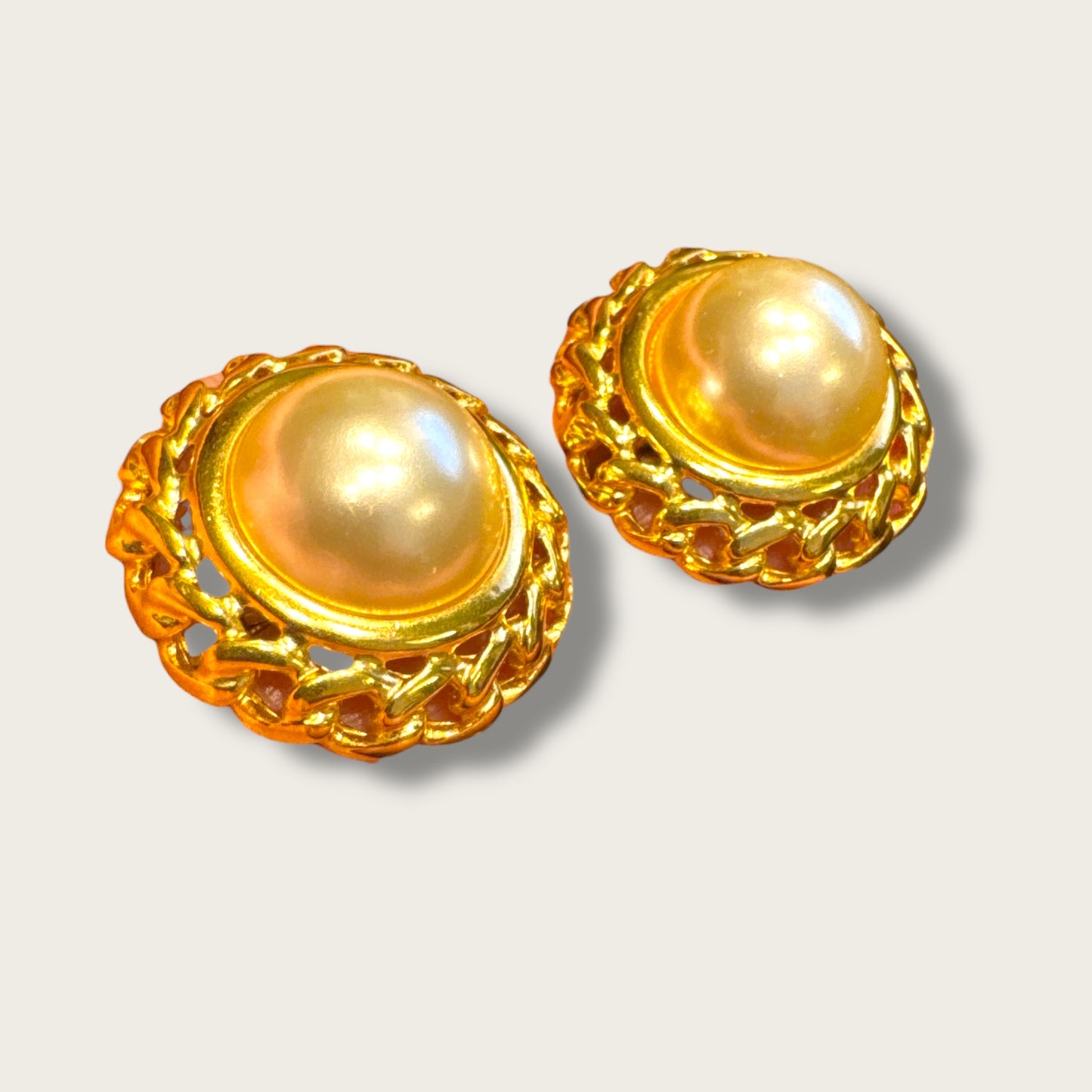 Vintage Napier Braided Gold-Tone Dome Earrings with Oversized Pearl Center – Chunky 1960s Statement Screwback Friction Ear Clips
