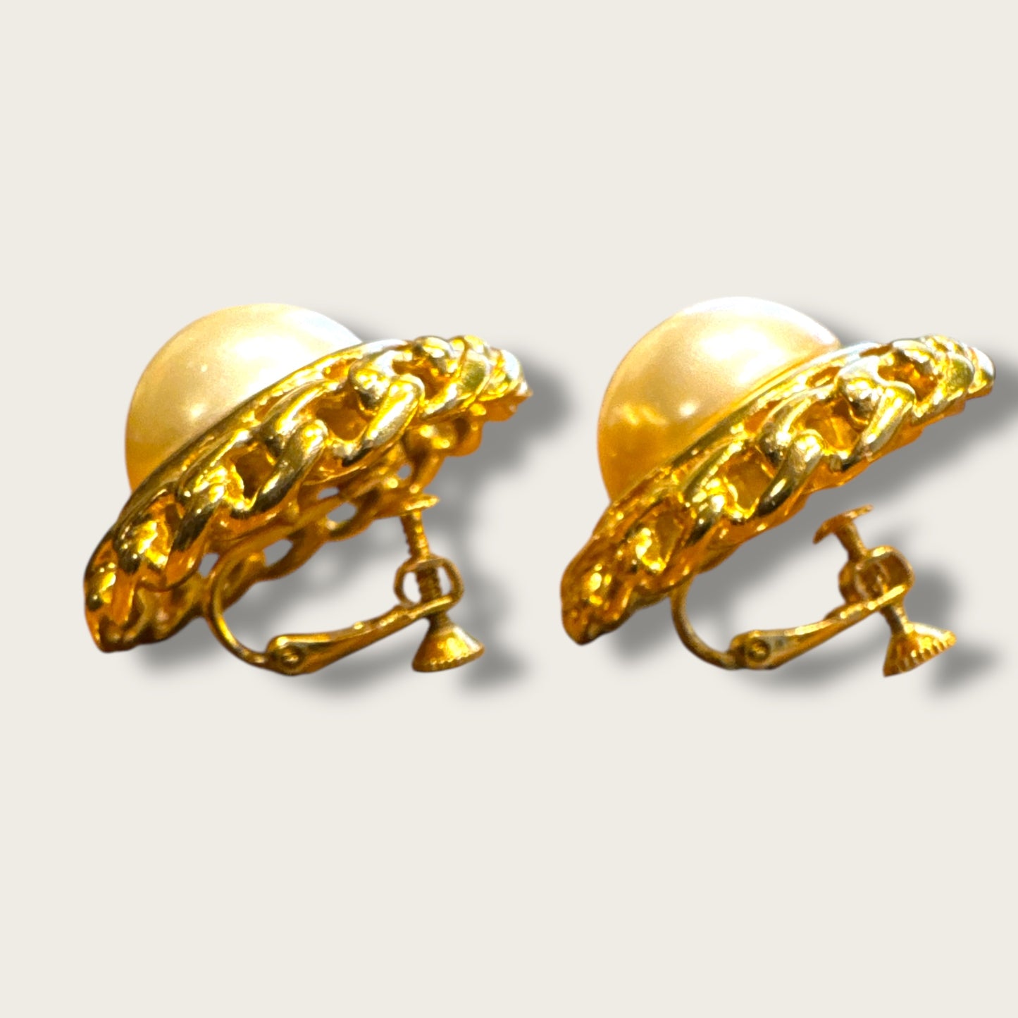 Vintage Napier Braided Gold-Tone Dome Earrings with Oversized Pearl Center – Chunky 1960s Statement Screwback Friction Ear Clips
