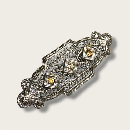 Vintage Silver-Tone Geometric Filigree Brooch with Champagne Rhinestones
