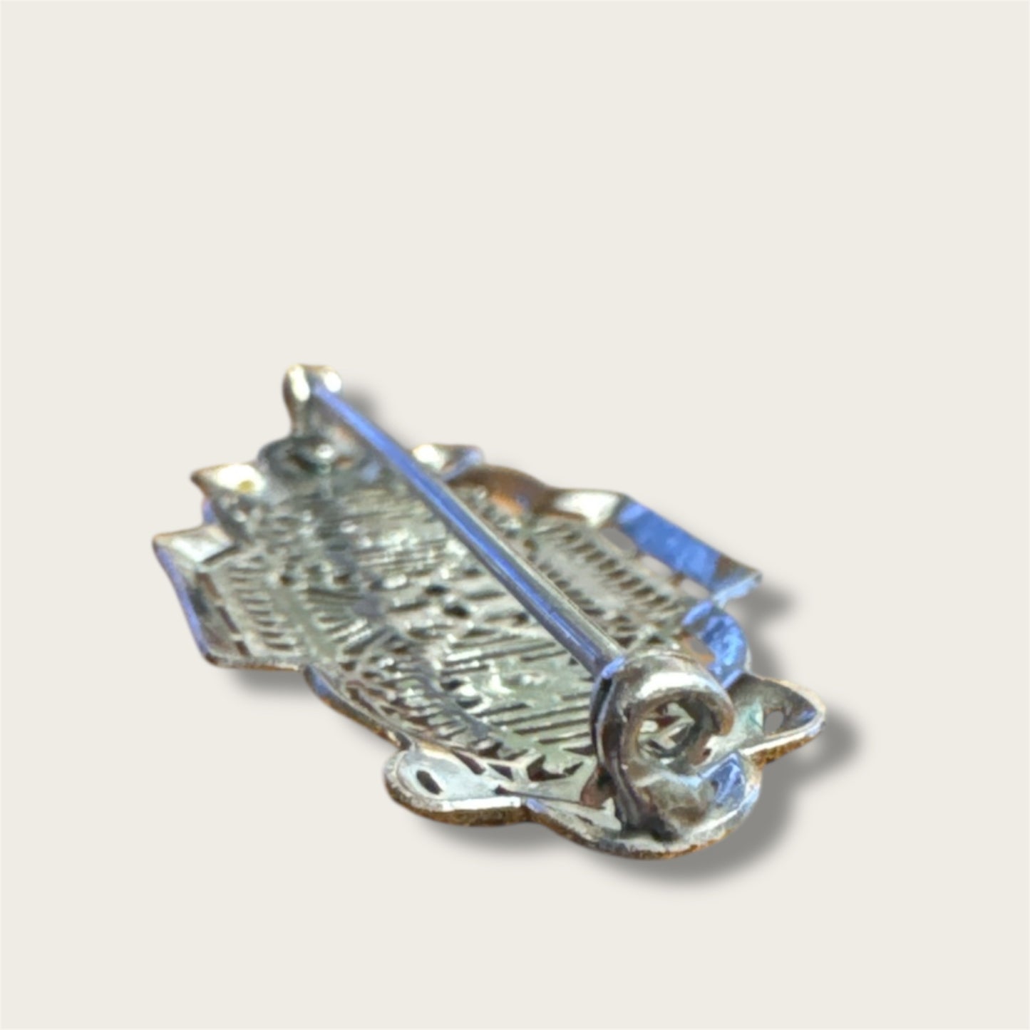Vintage Silver-Tone Geometric Filigree Brooch with Champagne Rhinestones