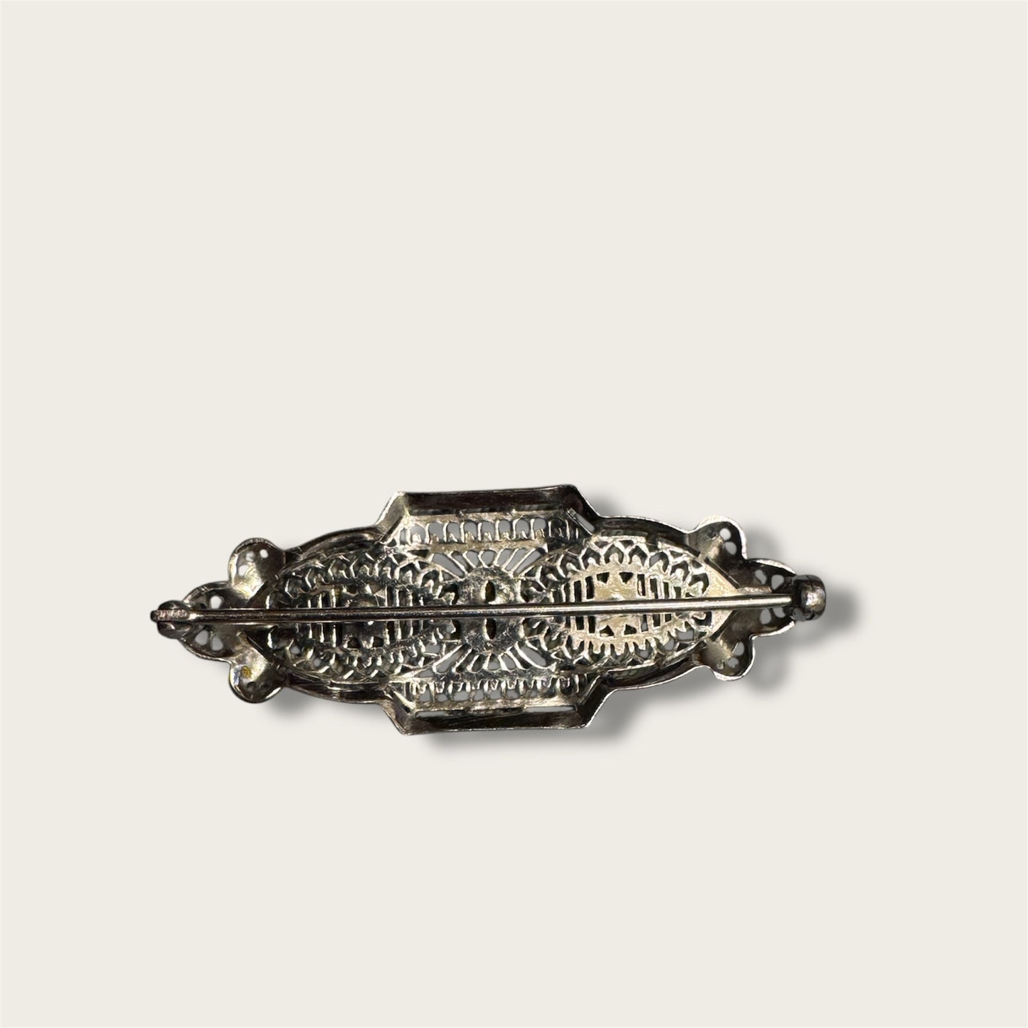 Vintage Silver-Tone Geometric Filigree Brooch with Champagne Rhinestones
