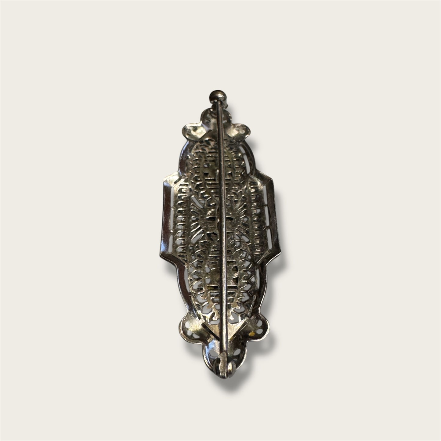 Vintage Silver-Tone Geometric Filigree Brooch with Champagne Rhinestones