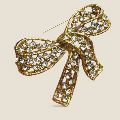 Vintage Rhinestone Bow Brooch – Gold Tone Statement