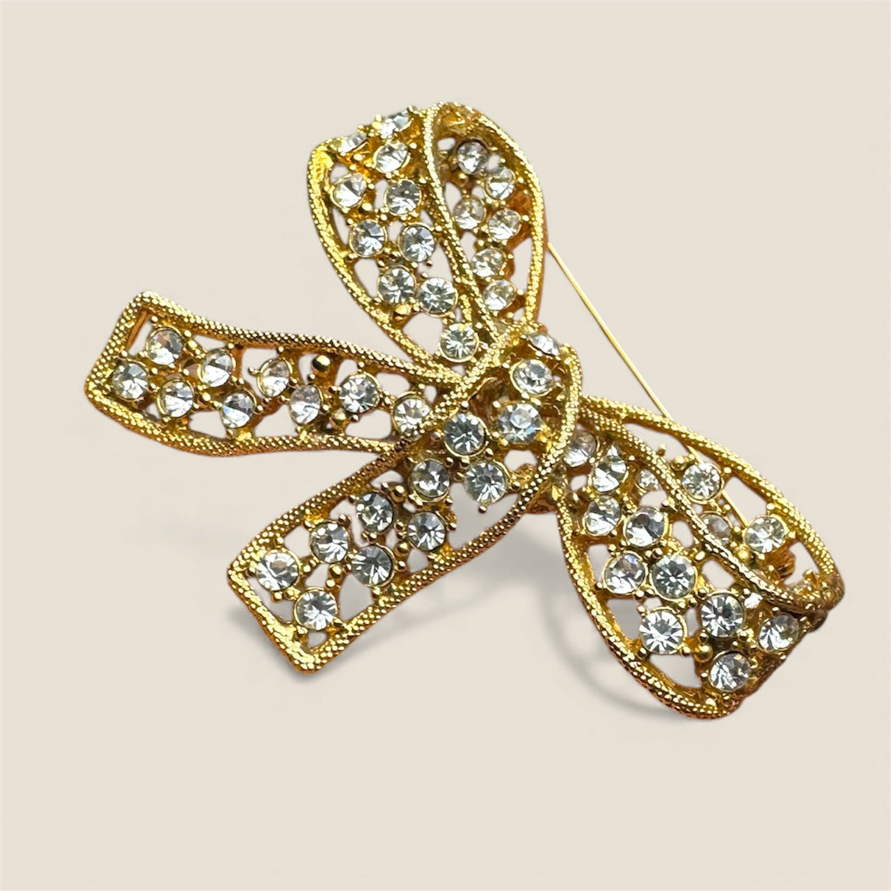 Vintage Rhinestone Bow Brooch – Gold Tone Statement