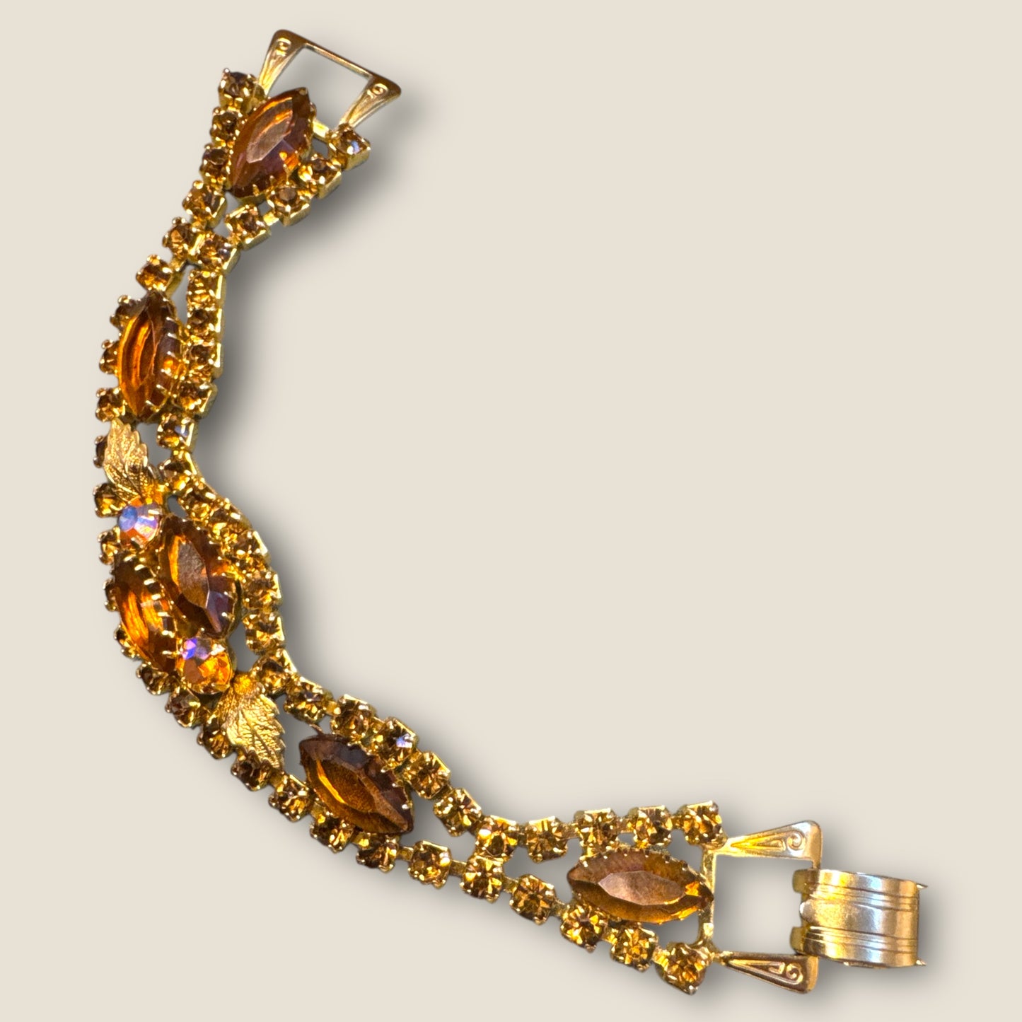 Vintage Gold Tone Rhinestone Panel Link Bracelet with Topaz & Root Beer Navettes