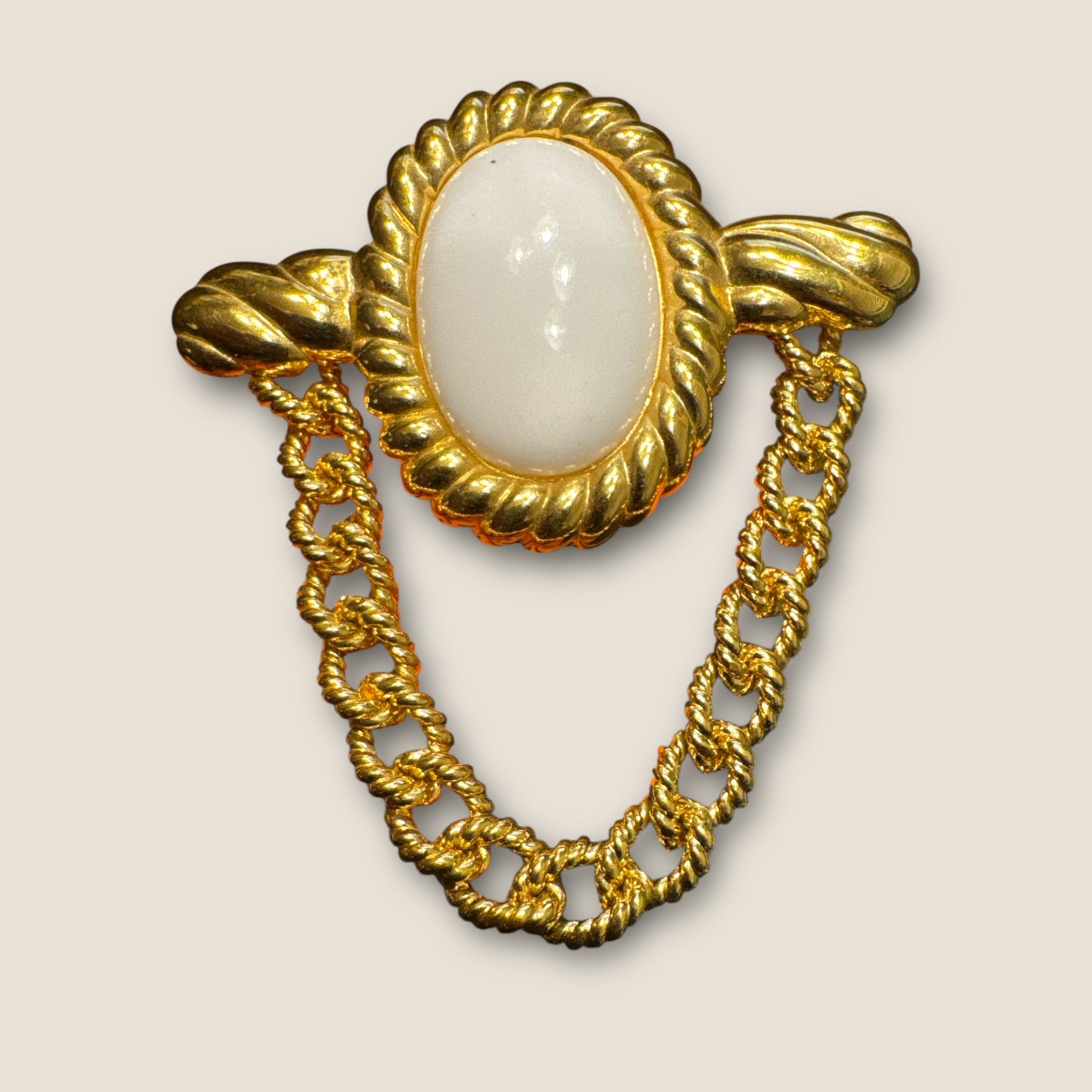 Vintage MONET Gold-Tone Chain Swag Brooch with White Lucite Cabochon