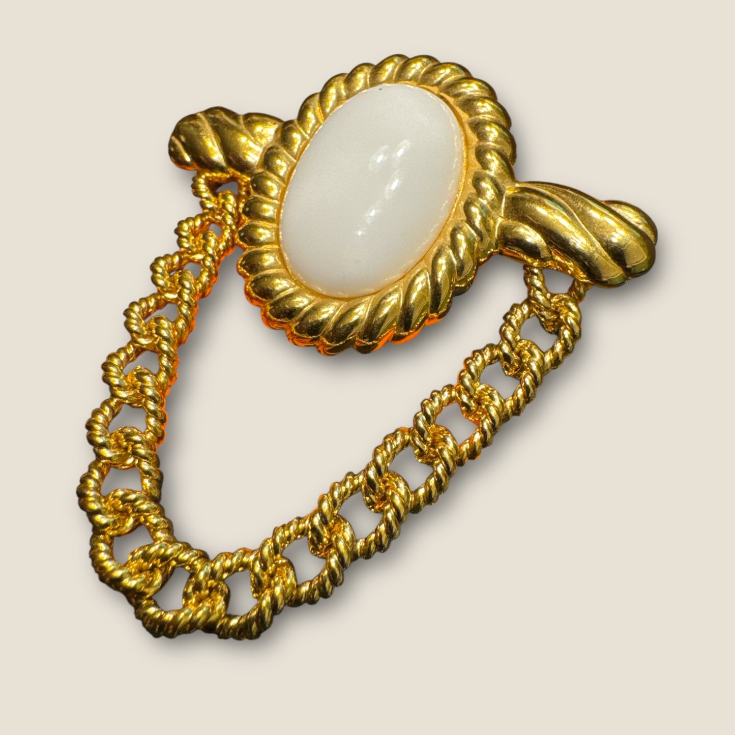 Vintage MONET Gold-Tone Chain Swag Brooch with White Lucite Cabochon