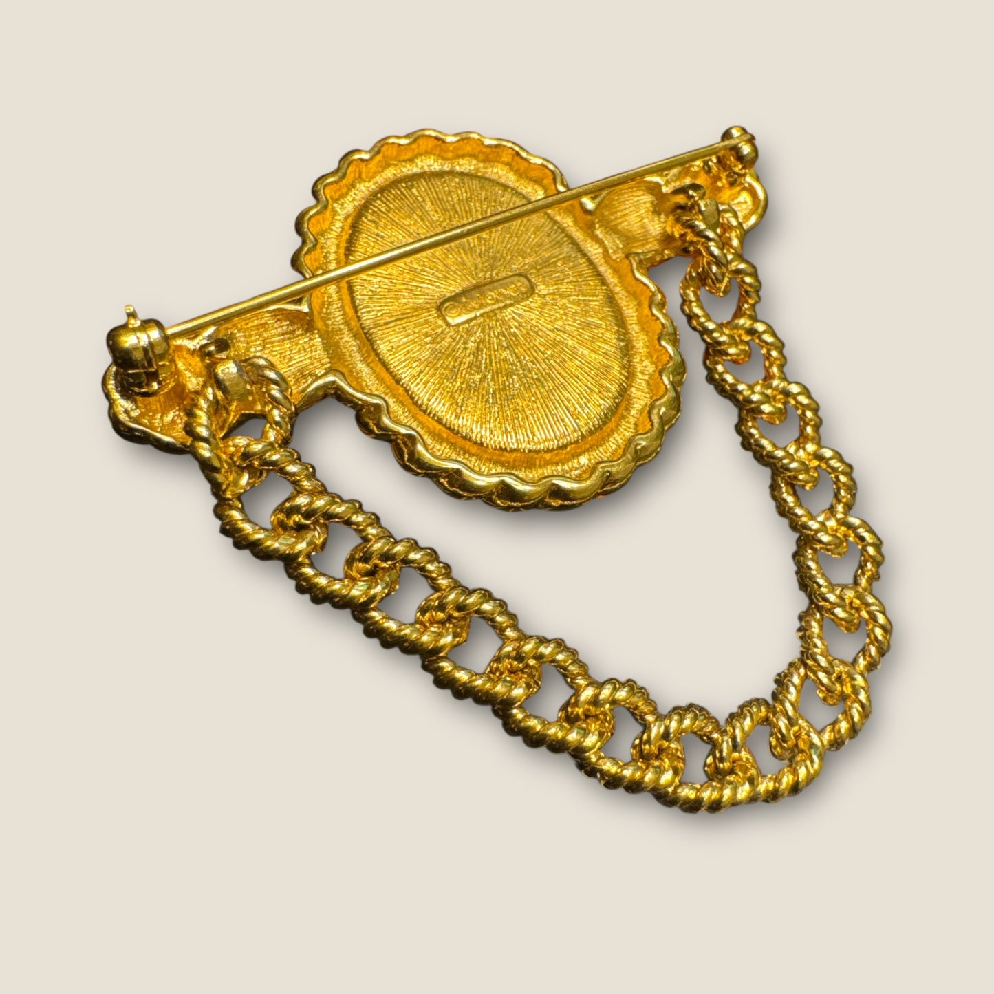Vintage MONET Gold-Tone Chain Swag Brooch with White Lucite Cabochon